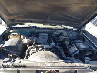 1997 Chevrolet Suburban with VIN 3GNFK16R9VG184722, listed as a IAAI auction lot 41662635 with 176,652 mi miles. Bid and sale history available at carsss.com. Image 10.