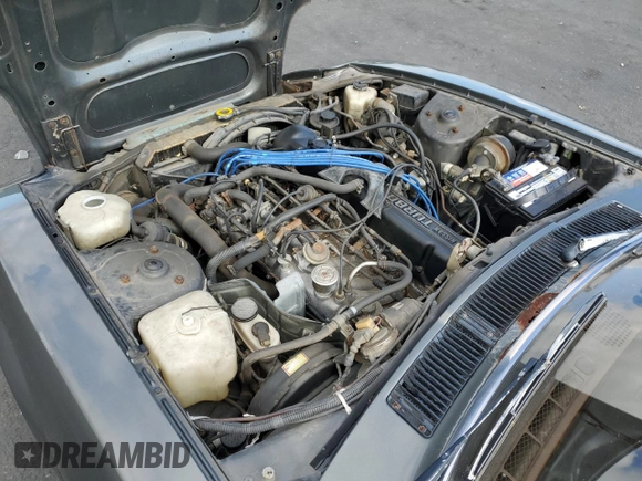 1983 Datsun 280ZX z VIN JN1CZ06S1DX700637, wystawiony jako Copart lot #53893855 z przebiegiem 93 909 mil mil oraz Tytuł czysty. Historia ofert i sprzedaży dostępna na DreamBid. Obrazek 11.