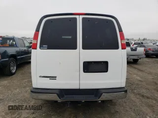 2012 Chevrolet Express Passenger 1LT with VIN 1GAZGYFG8C1174282, listed as a Copart auction lot 86012024 with 170,680 mi miles and Salvage title. Bid and sale history available at DreamBid. Image 6.