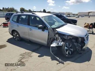 2018 Subaru Forester z VIN JF2SJABC6JH414603, wystawiony jako Copart lot #56666915 z przebiegiem 101 663 mil mil oraz Szkoda całkowita • Salvage title. Historia ofert i sprzedaży dostępna na DreamBid. Obrazek 4.