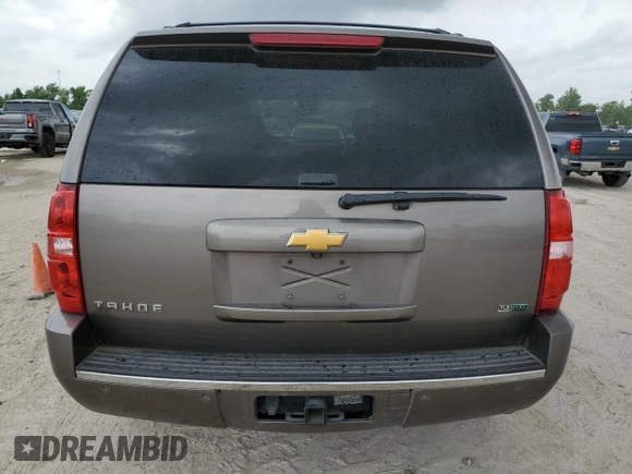 2012 Chevrolet Tahoe LTZ z VIN 1GNSCCE02CR259655, wystawiony jako Copart lot #55184505 z przebiegiem 199 189 mil mil oraz Szkoda całkowita • Salvage title. Historia ofert i sprzedaży dostępna na DreamBid. Obrazek 6.