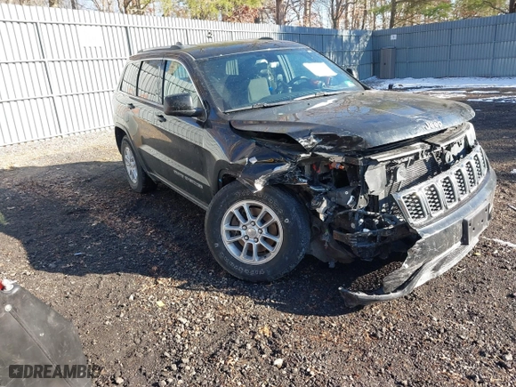 2018 Jeep Grand Cherokee Laredo E with VIN 1C4RJFAG4JC326631, listed as a IAAI auction lot 41191061 with 115,451 mi miles. Bid and sale history available at carsss.com. Image 1.