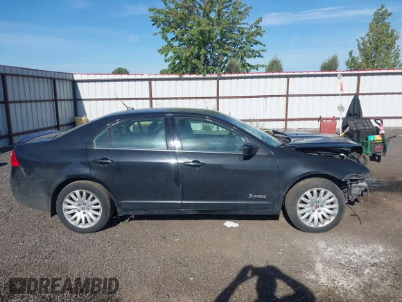 2010 Mercury Milan Hybrid z VIN 3MEDM0L31AR600585, wystawiony jako IAAI lot #42191197 z przebiegiem 216 491 mil mil oraz . Historia ofert i sprzedaży dostępna na DreamBid. Obrazek 14.
