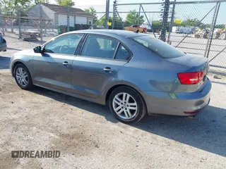 2015 Volkswagen Jetta S with VIN 3VW2K7AJ9FM202034, listed as a IAAI auction lot 42509287 with 141,588 mi miles and . Bid and sale history available at DreamBid. Image 3.