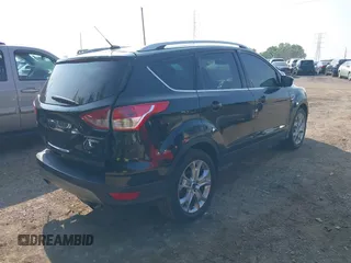 2014 Ford Escape Titanium with VIN 1FMCU9J93EUD60149, listed as a IAAI auction lot 39837388 with 154,880 mi miles. Bid and sale history available at carsss.com. Image 4.