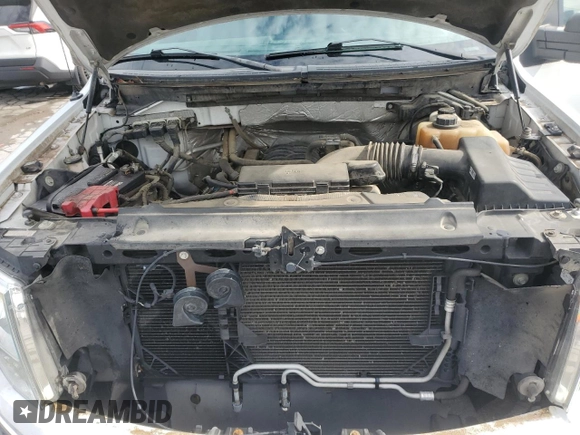 2013 Ford F-150 XL with VIN 1FTFW1EF7DFB68264, listed as a Copart auction lot 60271505 with 128,453 mi miles and Salvage title. Bid and sale history available at DreamBid. Image 11.