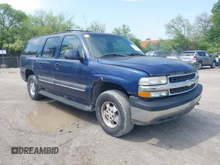 2002 Chevrolet Suburban LT z VIN 1GNFK16Z22J200124, wystawiony jako IAAI lot #42270704 z przebiegiem 218 478 mil mil oraz . Historia ofert i sprzedaży dostępna na DreamBid. Obrazek 1.