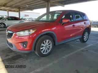 2015 Mazda CX-5 Touring with VIN JM3KE2CY3F0477352, listed as a Copart auction lot 49657395 with 112,926 mi miles and Salvage Title. Bid and sale history available at carsss.com. Image 1.