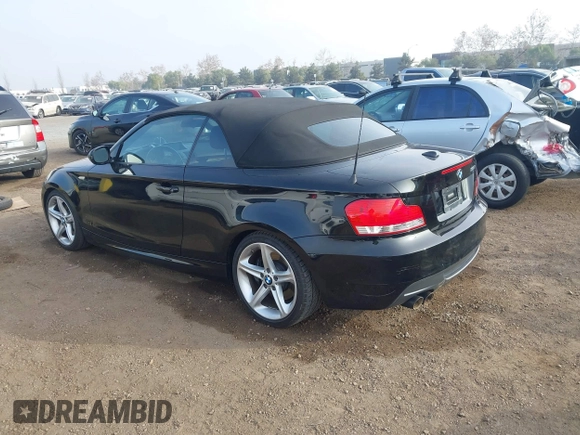 2010 BMW 1 Series 135i with VIN WBAUN9C54AVK41785, listed as a IAAI auction lot 41228825 with 60,817 mi miles and . Bid and sale history available at carsss.com. Image 3.