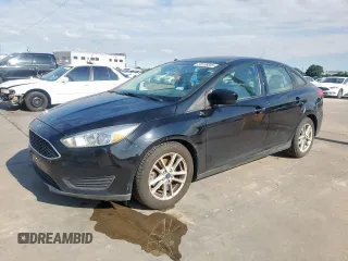 2018 Ford Focus SE z VIN 1FADP3F22JL206546, wystawiony jako Copart lot #59106685 z przebiegiem 100 680 mil mil oraz Tytuł czysty. Historia ofert i sprzedaży dostępna na DreamBid. Obrazek 1.