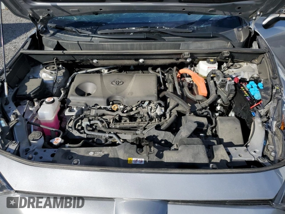 2023 Toyota RAV4 Hybrid XLE Premium with VIN 2T3BWRFV1PW157475, listed as a Copart auction lot 73371224 with 52,412 mi miles and Salvage title. Bid and sale history available at DreamBid. Image 12.