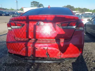 2018 Hyundai Sonata Sport with VIN 5NPE34AF2JH596644, listed as a IAAI auction lot 41986683 with 129,106 mi miles and . Bid and sale history available at carsss.com. Image 16.