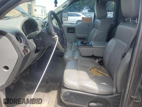 2004 Ford F-150 XL z VIN 1FTRF12W74NC16501, wystawiony jako Copart lot #57530505 z przebiegiem 186 508 mil mil oraz Szkody całkowita. Historia ofert i sprzedaży dostępna na DreamBid. Obrazek 7.