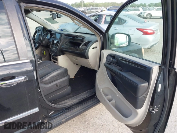 2013 Chrysler Town & Country Touring L with VIN 2C4RC1CG9DR778449, listed as a IAAI auction lot 42045779 with 217,776 mi miles and . Bid and sale history available at DreamBid. Image 5.