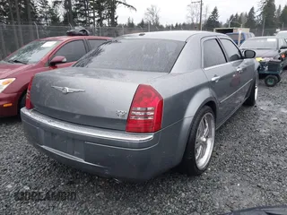 2006 Chrysler 300 C with VIN 2C3KA63H06H286676, listed as a IAAI auction lot 41231230 with 134,565 mi miles. Bid and sale history available at carsss.com. Image 4.