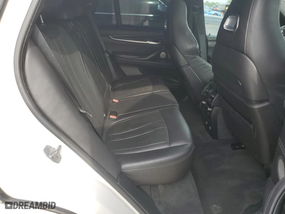 2016 BMW X5 M with VIN 5YMKT6C54G0R79100, listed as a Copart auction lot 55699044 with 106,772 mi miles. Bid and sale history available at carsss.com. Image 11.