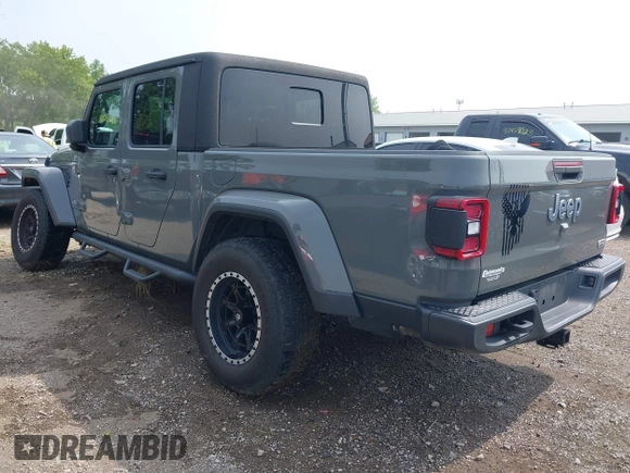 2020 Jeep Gladiator Overland with VIN 1C6HJTFG0LL169628, listed as a IAAI auction lot 42476729 with 102,874 mi miles and . Bid and sale history available at DreamBid. Image 3.