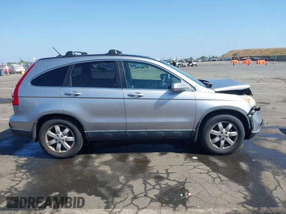 2007 Honda CR-V EX-L z VIN JHLRE38797C073861, wystawiony jako IAAI lot #42197139 z przebiegiem 284 164 mil mil oraz . Historia ofert i sprzedaży dostępna na DreamBid. Obrazek 13.