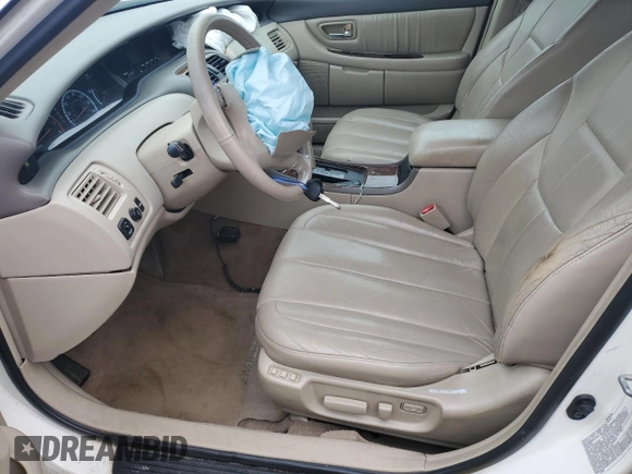 2000 Toyota Avalon XL with VIN 4T1BF28B6YU093177, listed as a Copart auction lot 51853895 with 189,631 mi miles and Salvage Title. Bid and sale history available at DreamBid. Image 7.
