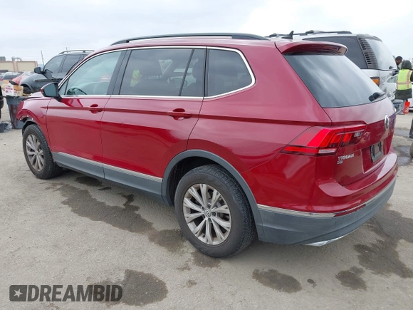 2018 Volkswagen Tiguan SEL with VIN 3VV3B7AX9JM031453, listed as a IAAI auction lot 42084781 with 82,931 mi miles and . Bid and sale history available at DreamBid. Image 3.