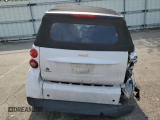 2009 Smart fortwo Passion with VIN WMEEK31XX9K279585, listed as a Copart auction lot 64770805 with Not provided miles and Salvage title. Bid and sale history available at DreamBid. Image 6.