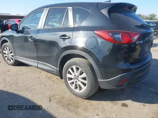 2016 Mazda CX-5 Touring with VIN JM3KE2CY6G0808992, listed as a IAAI auction lot 40969655 with 132,513 mi miles. Bid and sale history available at carsss.com. Image 3.