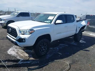2021 Toyota Tacoma 2WD SR5 with VIN 5TFAZ5CN9MX102053, listed as a IAAI auction lot 41649692 with 47,734 mi miles. Bid and sale history available at carsss.com. Image 20.