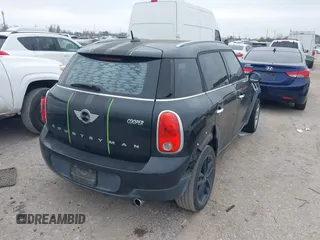 2015 MINI Countryman with VIN WMWZB3C53FWR43819, listed as a IAAI auction lot 41610007 with 134,185 mi miles and . Bid and sale history available at DreamBid. Image 4.