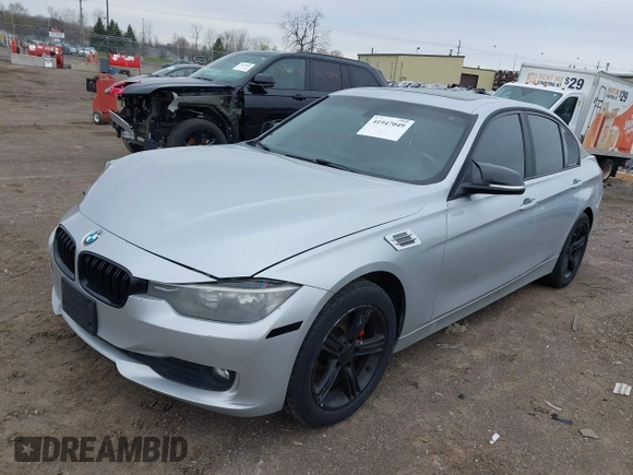 2014 BMW 3 Series 320i xDrive with VIN WBA3C3C58EP661364, listed as a IAAI auction lot 41947049 with 211,982 mi miles and . Bid and sale history available at DreamBid. Image 2.