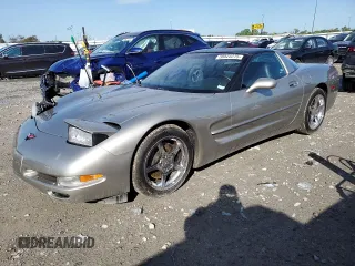 1999 Chevrolet Corvette with VIN 1G1YY22G2X5125766, listed as a Copart auction lot 58823275 with 29,158 mi miles and Salvage title. Bid and sale history available at DreamBid. Image 1.