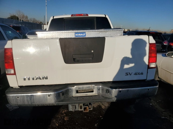 2012 Nissan Titan SV with VIN 1N6AA0EC1CN326088, listed as a Copart auction lot 42799335 with 163,218 mi miles and Salvage Title. Bid and sale history available at carsss.com. Image 6.