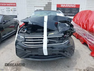 2022 Volkswagen Tiguan SE with VIN 3VV2B7AXXNM060140, listed as a IAAI auction lot 40300638 with 25,955 mi miles and . Bid and sale history available at DreamBid. Image 12.