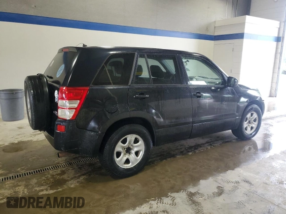 2009 Suzuki Grand Vitara with VIN JS3TE042694100010, listed as a Copart auction lot 56716225 with 148,495 mi miles and Salvage title. Bid and sale history available at DreamBid. Image 3.