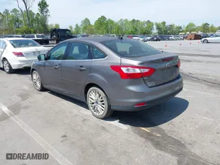 2012 Ford Focus SEL with VIN 1FAHP3H28CL282080, listed as a IAAI auction lot 42039926 with 134,785 mi miles. Bid and sale history available at carsss.com. Image 3.
