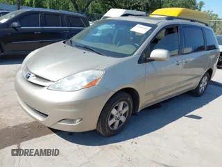 2010 Toyota Sienna XLE with VIN 5TDYK4CC5AS292110, listed as a IAAI auction lot 42055505 with 107,390 mi miles. Bid and sale history available at carsss.com. Image 2.