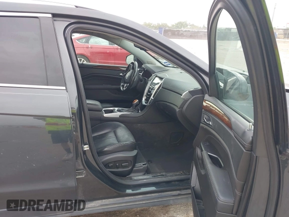 2016 Cadillac SRX Luxury Collection with VIN 3GYFNBE34GS522735, listed as a IAAI auction lot 42416899 with 142,561 mi miles and . Bid and sale history available at DreamBid. Image 5.