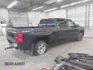 2017 Chevrolet Silverado 1500 LT with VIN 1GCUKREC0HF132896, listed as a IAAI auction lot 41192759 with 182,832 mi miles and . Bid and sale history available at DreamBid. Image 4.