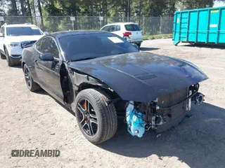 2020 Ford Mustang GT with VIN 1FA6P8CF9L5163585, listed as a IAAI auction lot 42066437 with 27,806 mi miles. Bid and sale history available at carsss.com. Image 1.