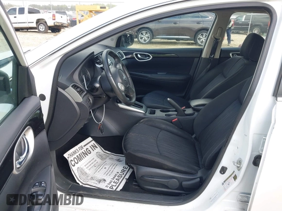 2018 Nissan Sentra S with VIN 3N1AB7AP2JY209169, listed as a IAAI auction lot 41942284 with 123,028 mi miles and . Bid and sale history available at DreamBid. Image 5.