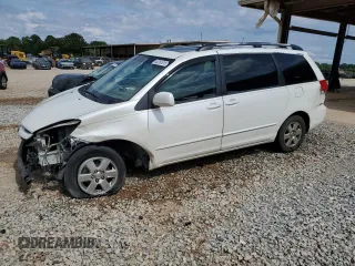 2010 Toyota Sienna XLE with VIN 5TDYK4CC3AS332426, listed as a Copart auction lot 60260515 with 182,792 mi miles and Salvage title. Bid and sale history available at DreamBid. Image 1.