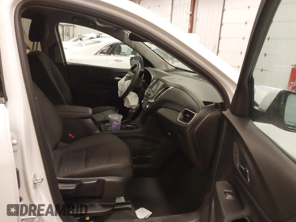 2018 Chevrolet Equinox LT z VIN 2GNAXSEV7J6138909, wystawiony jako IAAI lot #41295974 z przebiegiem 68 852 mil mil oraz . Historia ofert i sprzedaży dostępna na DreamBid. Obrazek 5.