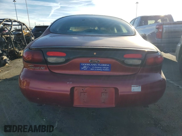 1998 Ford Taurus SE Comfort z VIN 1FAFP53S1WG176478, wystawiony jako Copart lot #80528034 z przebiegiem Nie podano mil oraz Szkoda całkowita • Salvage title. Historia ofert i sprzedaży dostępna na DreamBid. Obrazek 6.