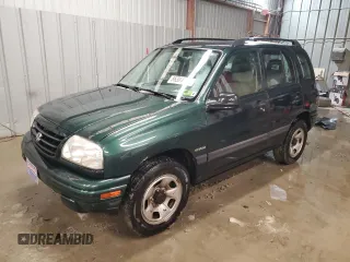 2002 Suzuki Vitara JLX z VIN 2S3TD52V126103138, wystawiony jako Copart lot #86304474 z przebiegiem 135 833 mil mil oraz Szkoda całkowita • Salvage title. Historia ofert i sprzedaży dostępna na DreamBid. Obrazek 1.