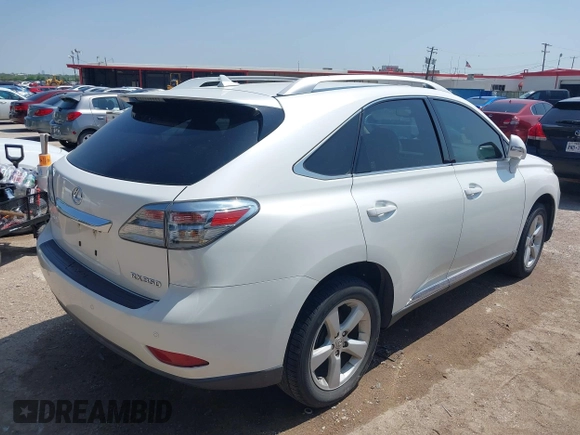 2012 Lexus RX with VIN JTJZK1BA2C2414593, listed as a IAAI auction lot 41929541 with 101,808 mi miles and . Bid and sale history available at carsss.com. Image 4.