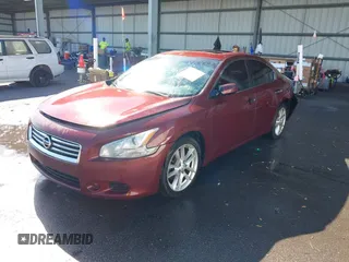 2013 Nissan Maxima SV with VIN 1N4AA5APXDC804570, listed as a IAAI auction lot 42052696 with 191,791 mi miles and . Bid and sale history available at DreamBid. Image 2.