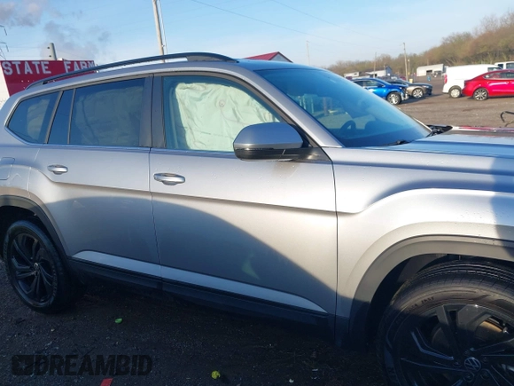 2023 Volkswagen Atlas SE with VIN 1V2HR2CA6PC523233, listed as a IAAI auction lot 41952399 with 28,387 mi miles and . Bid and sale history available at DreamBid. Image 13.