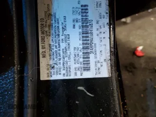 2010 Ford Fusion SE z VIN 3FAHP0HA1AR416870, wystawiony jako Copart lot #55585835 z przebiegiem 58 211 mil mil oraz Szkoda całkowita • Salvage title. Historia ofert i sprzedaży dostępna na DreamBid. Obrazek 14.