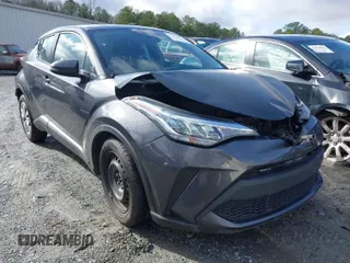 2021 Toyota C-HR LE with VIN NMTKHMBX9MR128998, listed as a IAAI auction lot 41575235 with 96,908 mi miles. Bid and sale history available at carsss.com. Image 1.