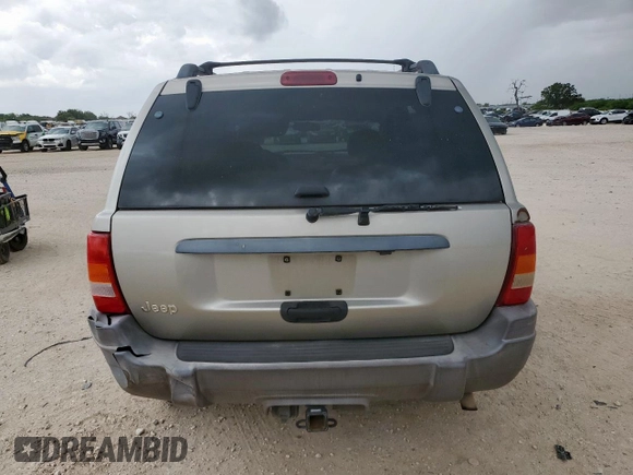 2003 Jeep Grand Cherokee Laredo with VIN 1J4GX48S13C609036, listed as a Copart auction lot 63143505 with 127,188 mi miles and Clean title. Bid and sale history available at DreamBid. Image 6.