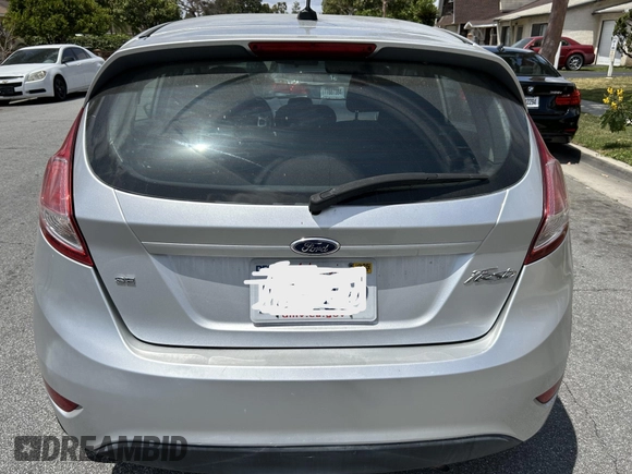 2015 Ford Fiesta SE z VIN 3FADP4EJ8FM167515, wystawiony jako IAAI lot #42153873 z przebiegiem 100 559 mil mil oraz . Historia ofert i sprzedaży dostępna na DreamBid. Obrazek 12.